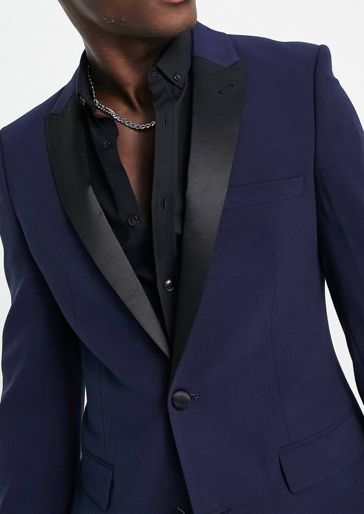 navy blue peak lapel suit